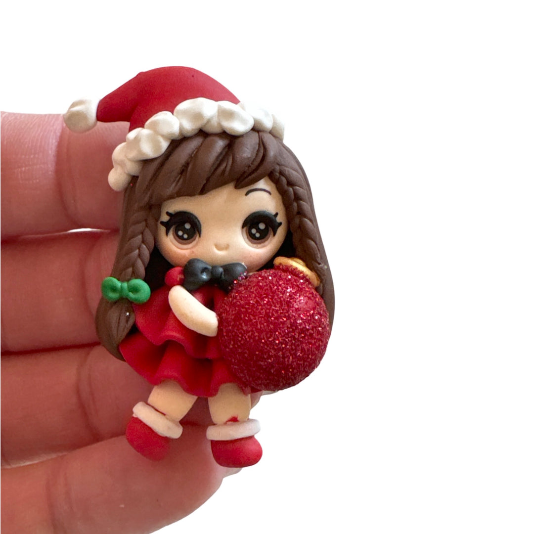 Christmas Girl holding Red Glitter Bauble Bow Clay from Temptress Maker