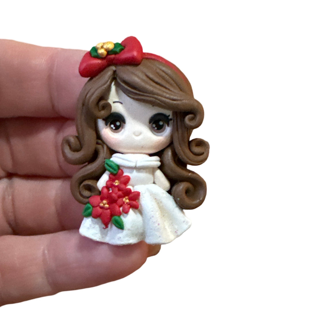 Christmas Girl holding Poinsetta Bow Clay - Brunette Hair