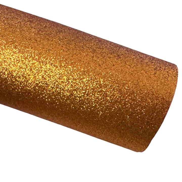 Feuille de tissu orange à fines paillettes