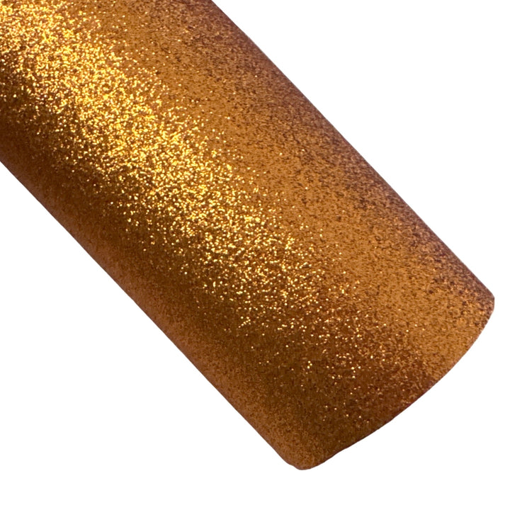 Feuille de tissu orange à fines paillettes