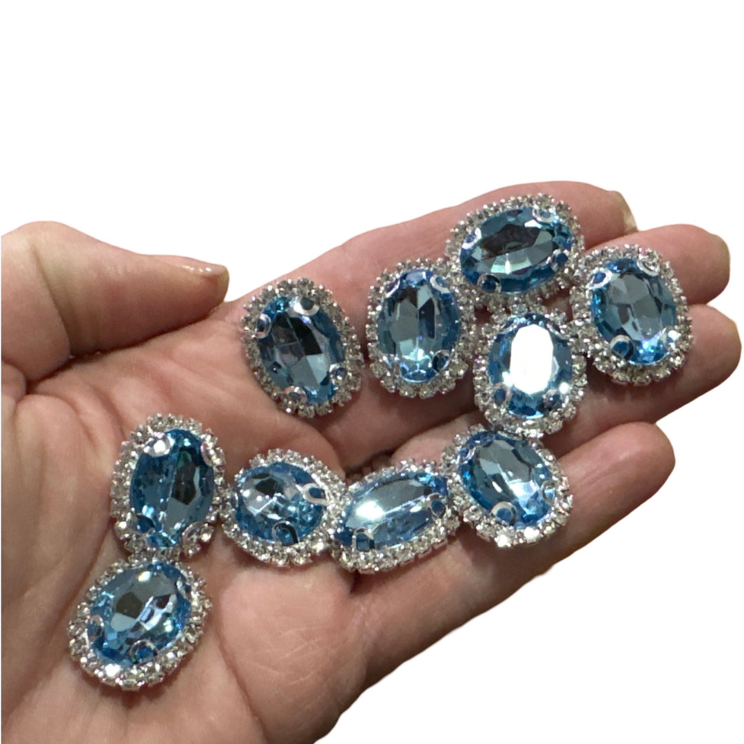 Oval Shape Ceylon Sapphire Rhinestone Embellishments in a Silver Claw Setting
