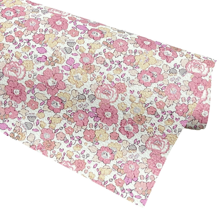 Similicuir floral rose pêche