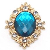 Teal Oval Rhinestone Embellishments in a Gold Setting