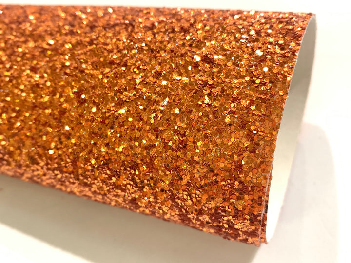 Feuille de tissu orange à grosses paillettes