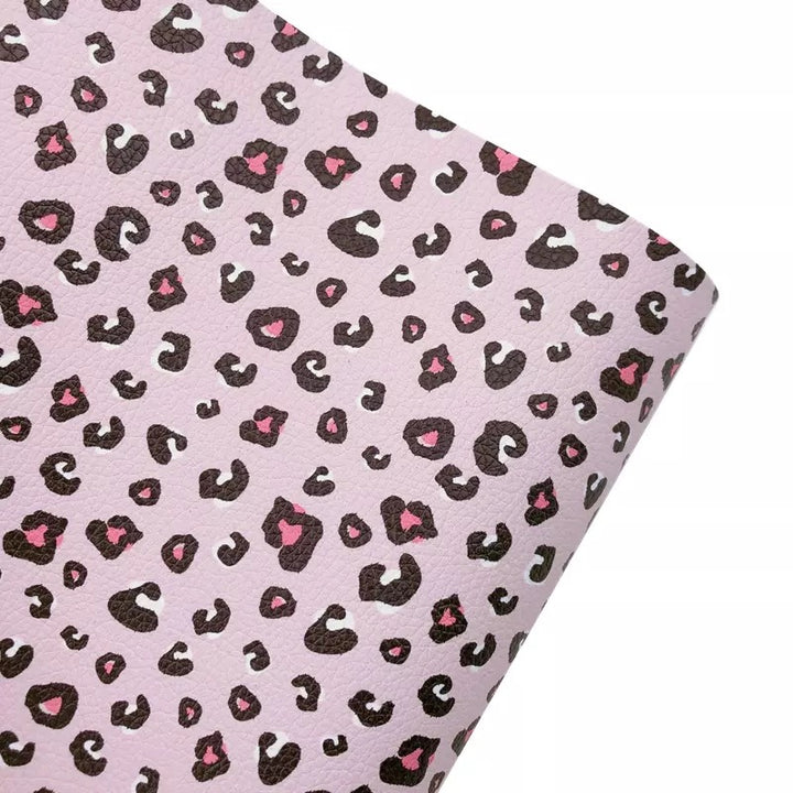 Drap en similicuir rose à imprimé animal