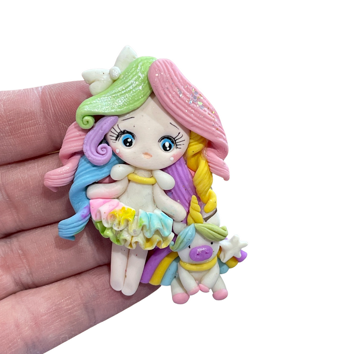 Rainbow Girl with Unicorn Bow Clay from our Enchanted Maker
