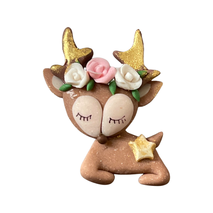 Sitting Deer with Golden Antlers Bow Clay from our Enchanted Maker