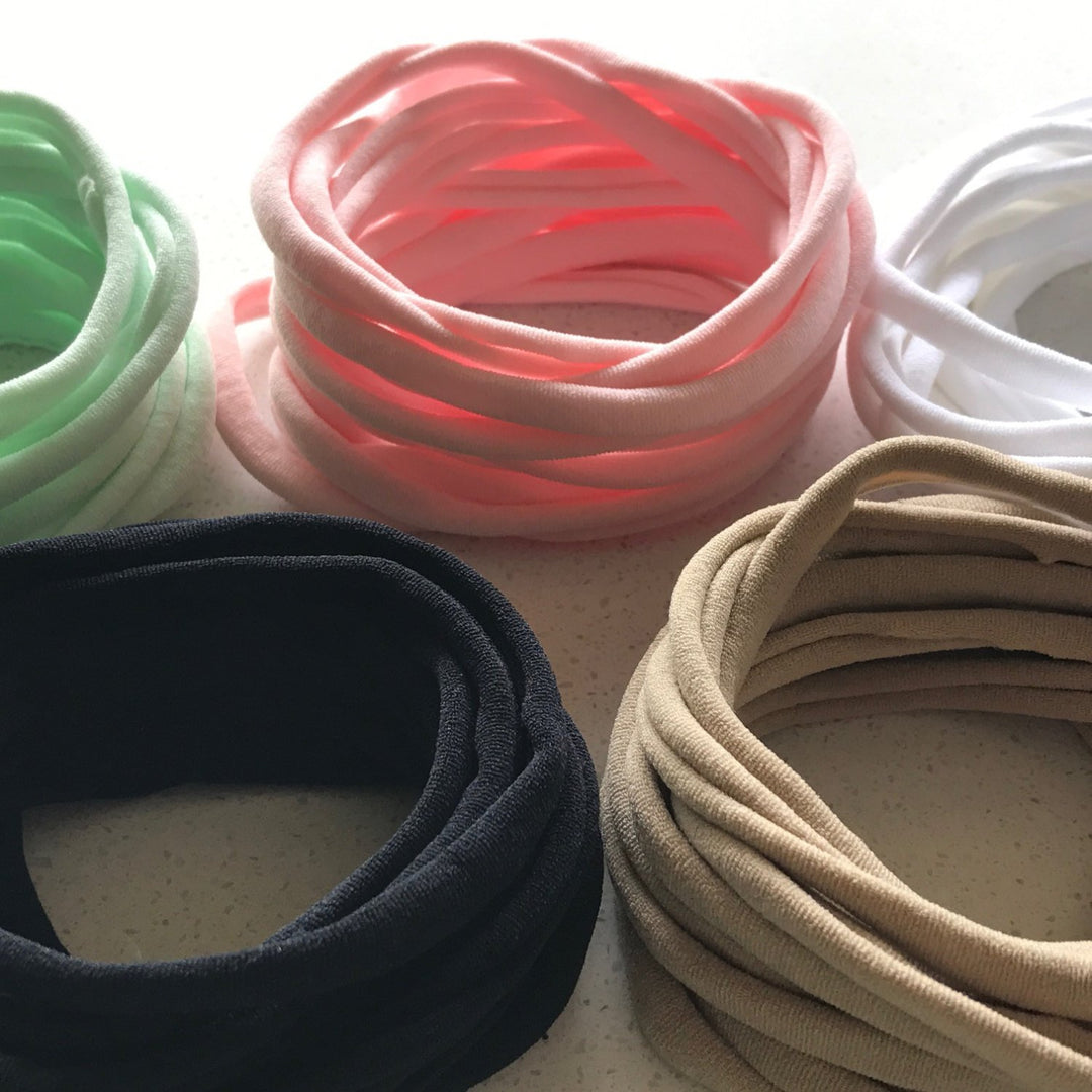 50 Pieces Super Soft Thin Wholesale Nylon Elastic Baby Headbands One Size Fits All | 5-6 mm | 26cm |